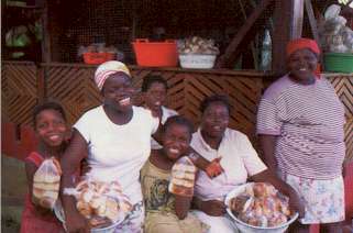 Garifuna Ladies Selling Coconut Bread on Roatan Honduras